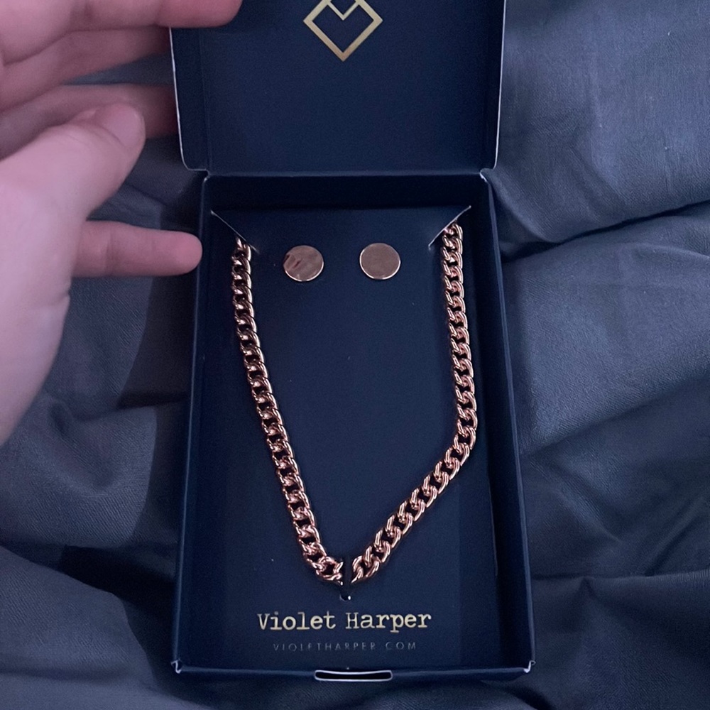 gold necklace and earring